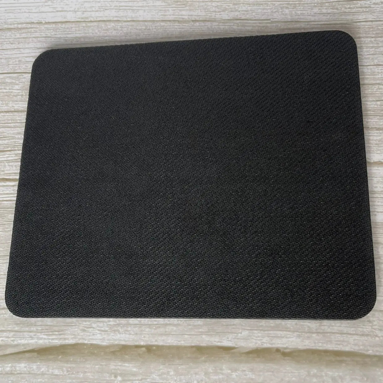 Base en caoutchouc noir antidérapant du tapis de souris